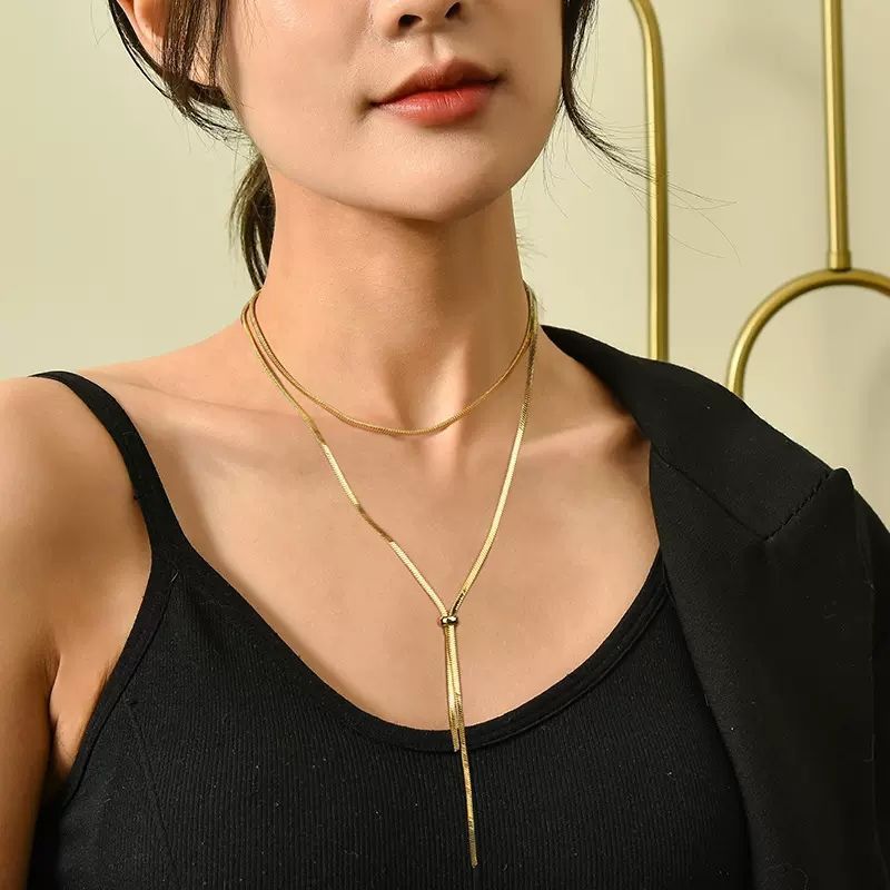 "Titanium Steel Extra-Long Retractable Snake Bone Chain Necklace for Women – 2024 New Elegant Sweater Chain"